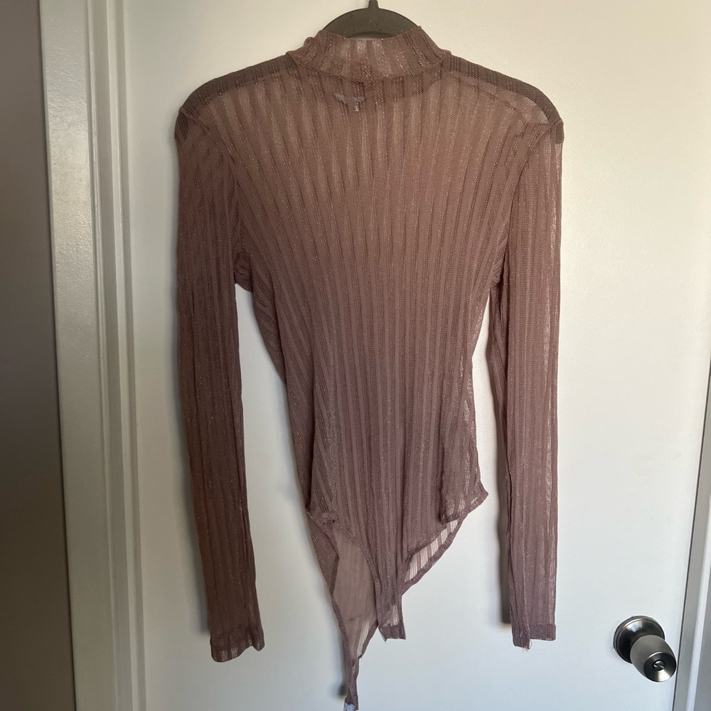 Shimmery and translucent body suit size M